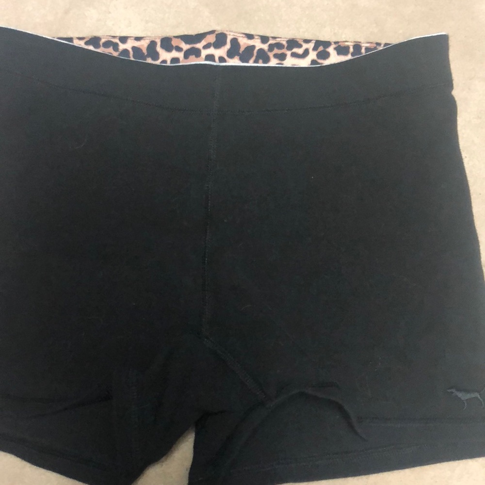 Pink yoga shorts.